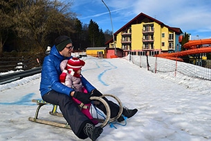 Vacanze invernali a Trebesing, Austria, sullo slittino