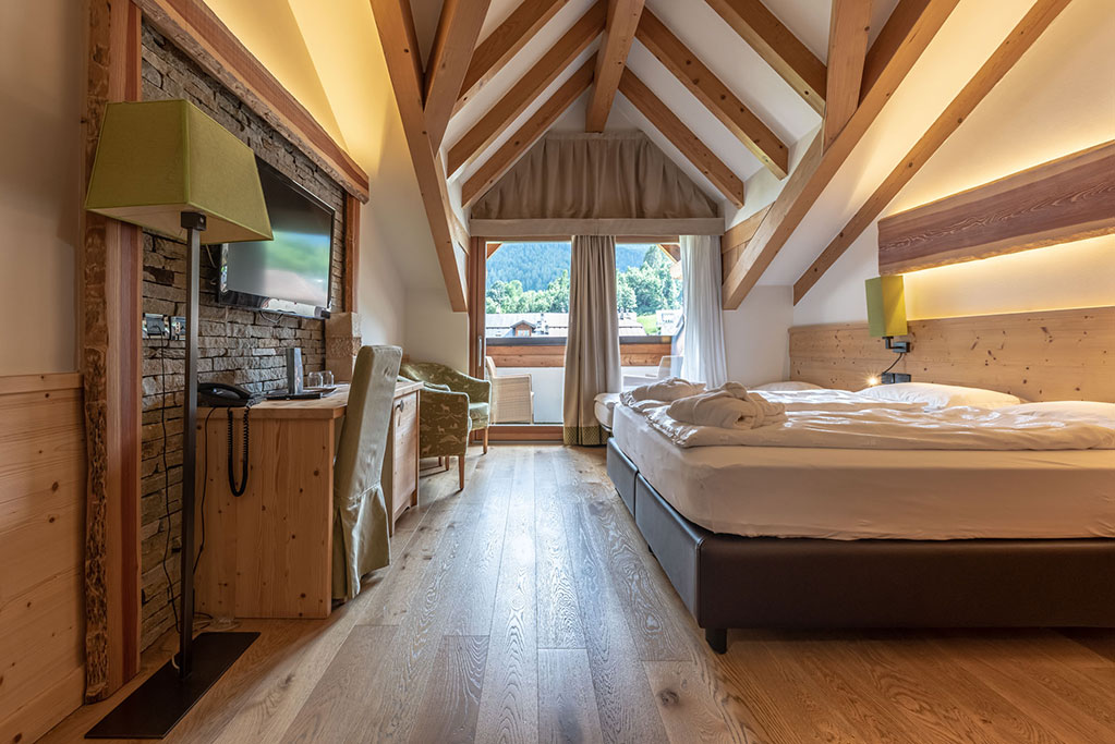AlpHoliday Dolomiti family hotel per bambini in Val di Sole, camera junior suite