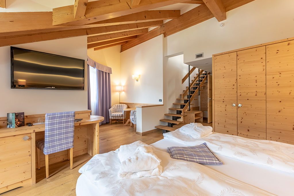 AlpHoliday Dolomiti family hotel per bambini in Val di Sole, camera junior suite