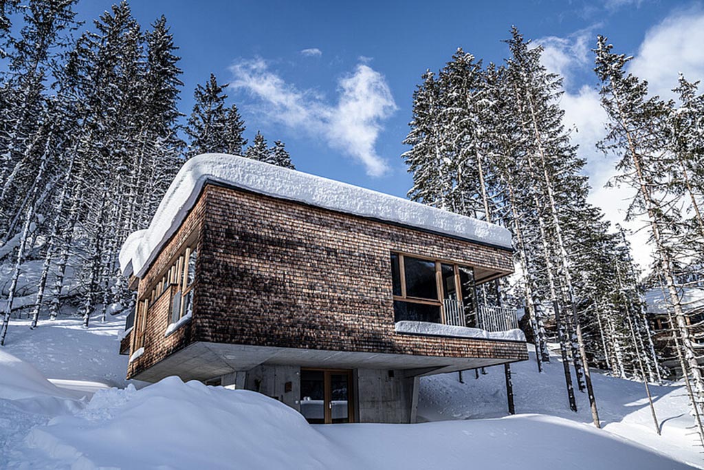 Gradonna Mountain Resort per bambini in Osttirol, chalet nella neve